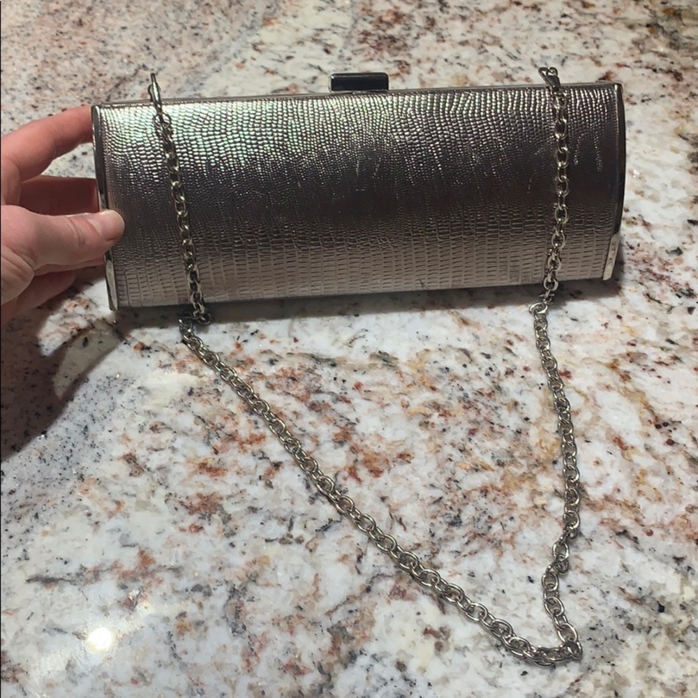 Evening clutch with chain shoulder strap.